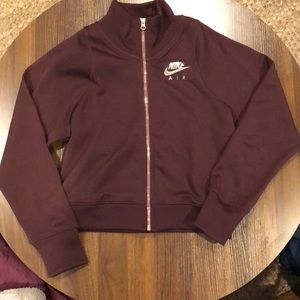 Maroon Nike zip-up sweatshirt